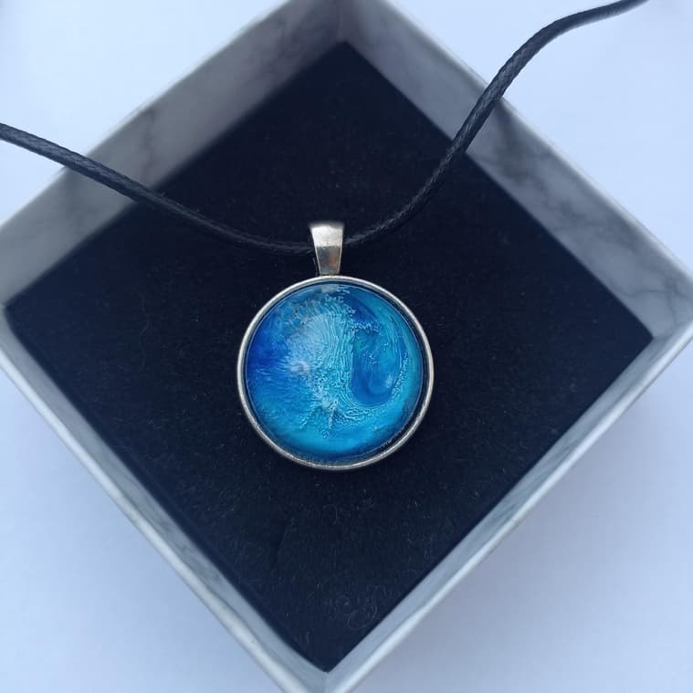 SafeSphere wearable disguised as a pendant